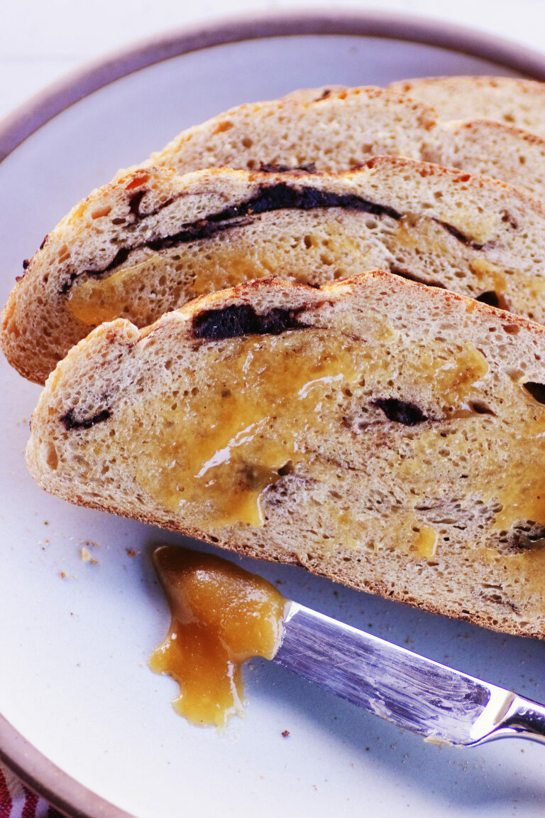 chocolate chunk sourdough bread topped with honey